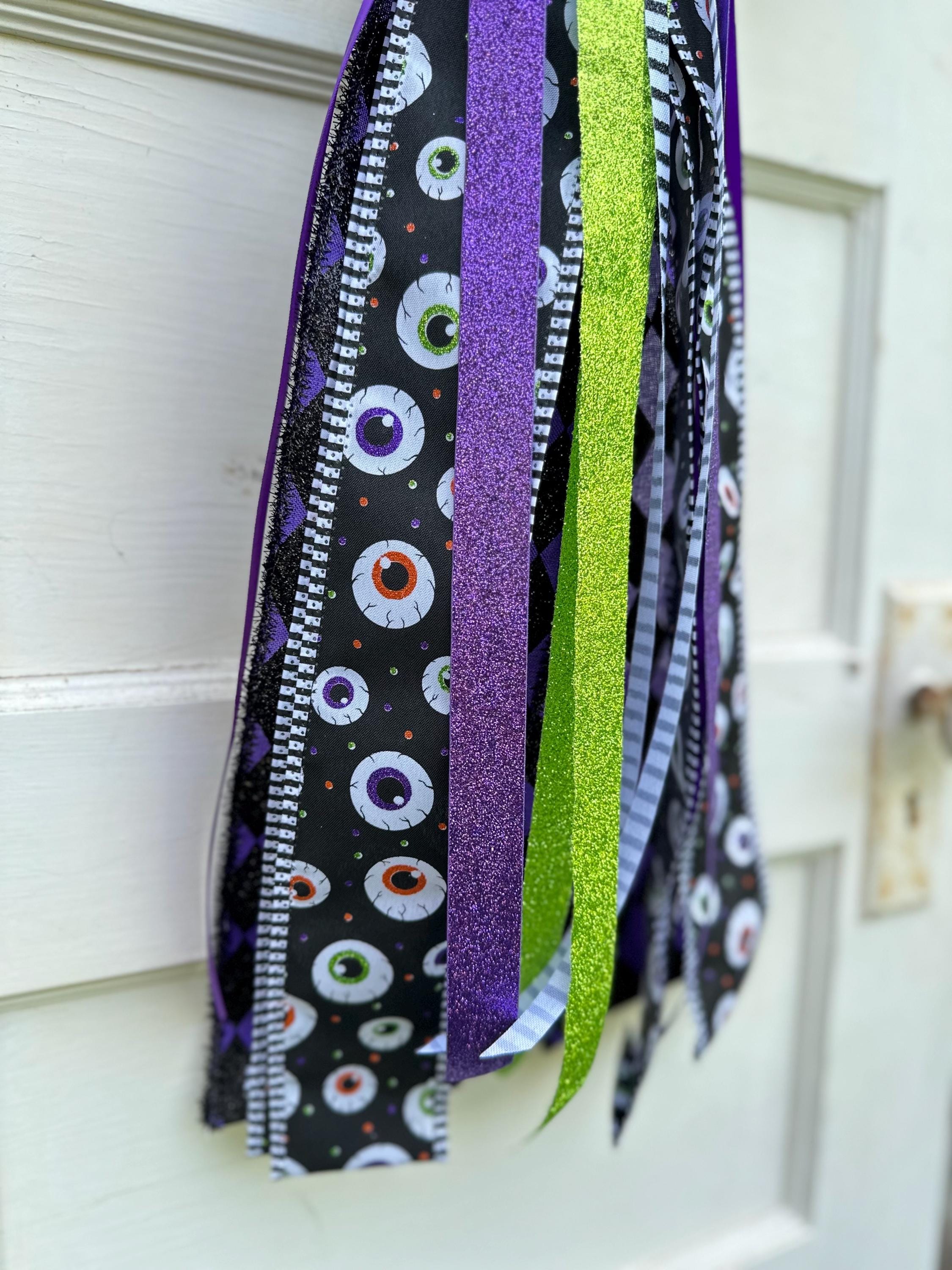 Spooky Entrance Display Halloween Door Sash Gothic Style Design Mixed Ribbon Collection Purple Black Lime Accents Eyeball Pattern Detail Premium Construction Quality Glitter Satin Elements Custom Size Bow Seasonal Theme Display
