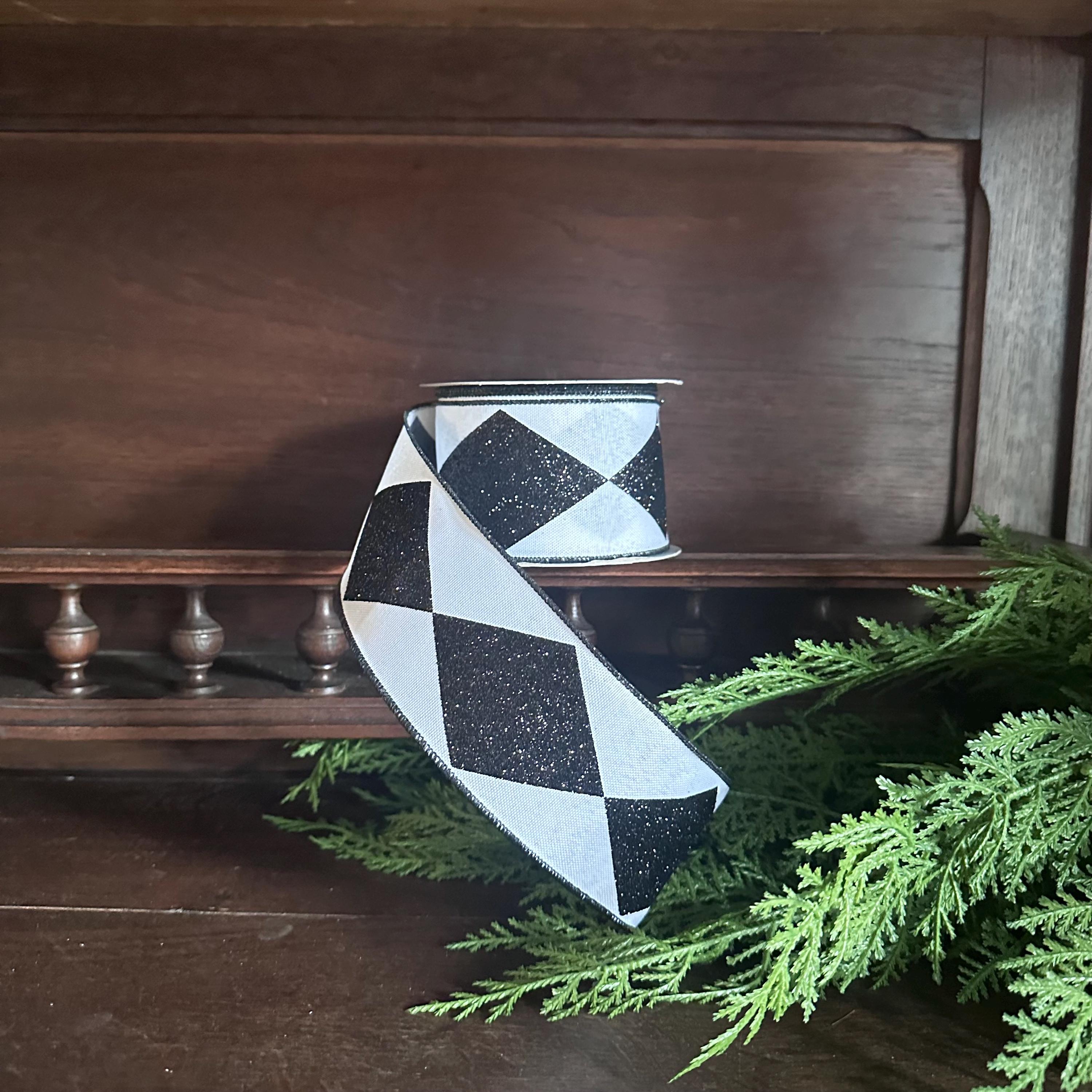 Sparkling Holiday Ribbon: Perfect for Your Creative Projects
Eye-catching black and white harlequin diamond pattern with glitter accents
Durable 2.5 inch wide polyester ribbon with wired edges for easy shaping
10 yard length provides ample material for multiple crafting projects
Versatile design works beautifully for wreaths, bows, and holiday decorations
High-quality construction ensures your creations last through multiple seasons